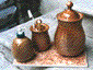 Francis Dumelie, maitre artisan, service à champagne, poterie, poterie du fil de l'eau, photoémaillage, bateau d'argile et d'eau 