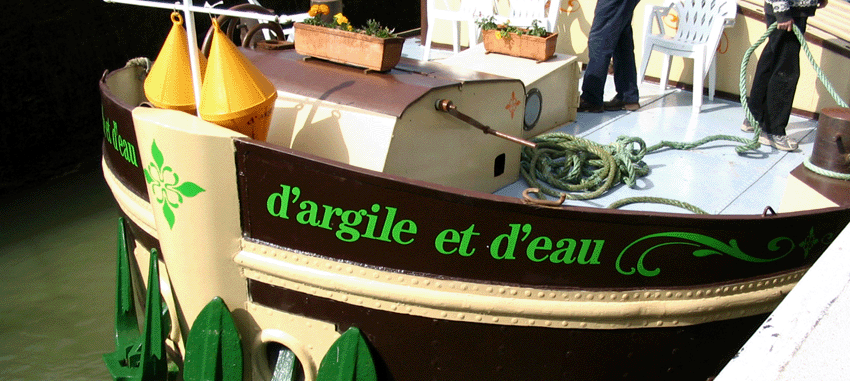 Francis Dumelie, Francis Dumelié, maitre artisan, service à champagne, poterie, poterie du fil de l'eau, photoémaillage, bateau d'argile et d'eau 